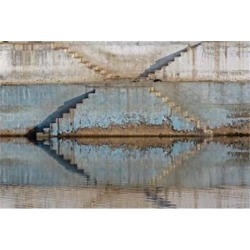 Steps mirrored on small lake, Jodhpur, India Poster Print by Adam Jones (35 x 23)