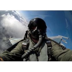 A pilot in the cockpit of an F-16 Fighting Falcon Poster Print (33 x 23)