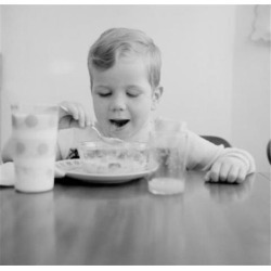 Posterazzi SAL255424935 Boy Eating Breakfast Cereal Poster Print - 18 x 24 in.