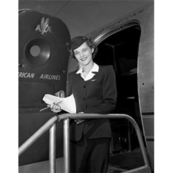 Posterazzi SAL255417978 Young Female Flight Attendant Standing in Aiplane Door & Smiling Poster Print - 18 x 24 in.