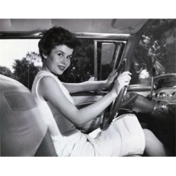 Posterazzi SAL2557877 Young Woman Sitting in the Drivers Seat of a Car & Smiling Poster Print - 18 x 24 in.