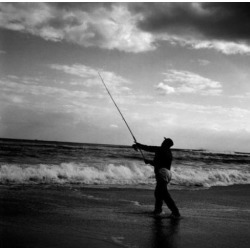Posterazzi SAL255417828 Man Fishing at the Edge of Water Poster Print - 18 x 24 in.