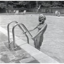 Posterazzi SAL255421067 Attractive Young Woman Standing in Swimming Pool Poster Print - 18 x 24 in.