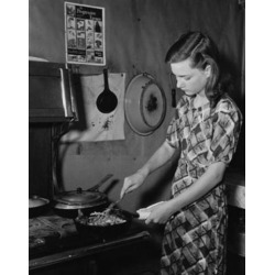 Posterazzi SAL9901965 Young Woman Cooking Food in the Kitchen Poster Print - 18 x 24 in.