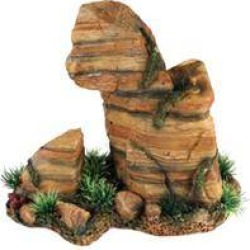 Stone Rock Formation With Plant