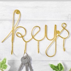 Gold Hooks In A Script Font
