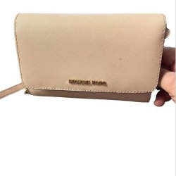 Michael Kors Bags | Gently Used Michael Kors Walletcellphone Crossbody. | Color: Pink | Size: Os found on Bargain Bro from poshmark, inc. for USD $51.68