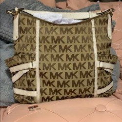 Michael Kors Bags | Medium Michael Kors Bag. | Color: Tan | Size: Os found on Bargain Bro from poshmark, inc. for USD $76.00