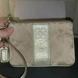 Coach Bags | Beige Coach Wristlet | Color: Cream/Tan | Size: Os found on Bargain Bro Philippines from poshmark, inc. for $25.00