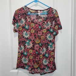 Lularoe Tops | Pink Floral Lularoe Tee | Color: Pink | Size: M found on Bargain Bro from poshmark, inc. for USD $11.40