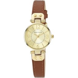 Montre dorée avec bracelet en cuir