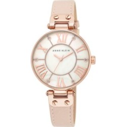 Montre rose doré avec bracelet en cuir