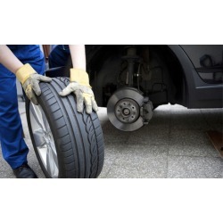 Wheel Alignment or Gift Certificate at IWC Motorsports Tire Pros (Up to 50% Off). Three Options Available.