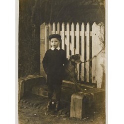 Poster: A Young Boy Poses with His Pet Dog, Probably a Whippet, by a G