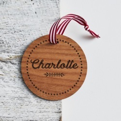 Personalised name with dots border round wooden Christmas decoration