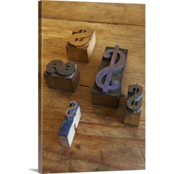 Large Solid-Faced Canvas Print Wall Art Print 20 x 30 entitled Close up of printing blocks with dollar sign on wood