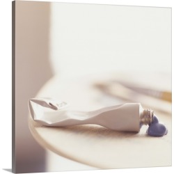 Large Solid-Faced Canvas Print Wall Art Print 20 x 20 entitled Tube of paint and brush on table, (Close-up)