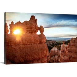 Large Solid-Faced Canvas Print Wall Art Print 30 x 20 entitled Sun peeking through a natural hole in the hoodoos at Bryce ...