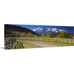 Large Solid-Faced Canvas Print Wall Art Print 48 x 16 entitled Fence along a road, Sneffels Range, Colorado