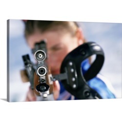 Large Gallery-Wrapped Canvas Wall Art Print 30 x 20 entitled Woman shooting rifle in biathlon (focus on nozzle)