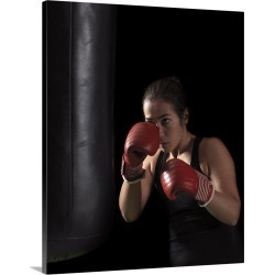 Large Solid-Faced Canvas Print Wall Art Print 24 x 30 entitled Boxer training on punching bag