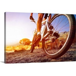 Large Gallery-Wrapped Canvas Wall Art Print 24 x 16 entitled Cyclist riding a mountain bike on a rocky trail at sunrise
