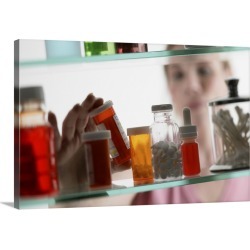 Large Solid-Faced Canvas Print Wall Art Print 30 x 20 entitled Woman taking pills from medicine cabinet