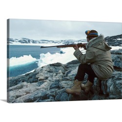 Large Gallery-Wrapped Canvas Wall Art Print 30 x 20 entitled Man sitting on seashore hunting