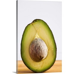 Large Solid-Faced Canvas Print Wall Art Print 20 x 30 entitled Close Up Of An Avocado Standing Upright Cut In Half With Th...