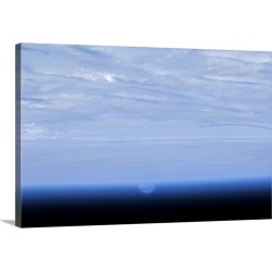 Large Gallery-Wrapped Canvas Wall Art Print 30 x 20 entitled Distorted by the lens of the Earth's atmosphere, the Moon ris...